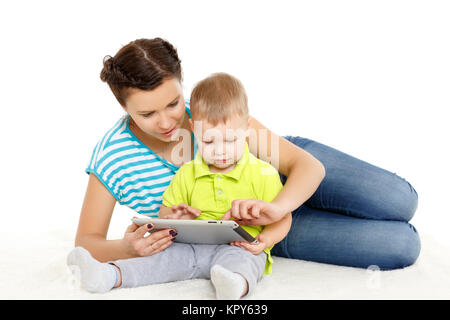 Happy family with computer tablet. Stock Photo