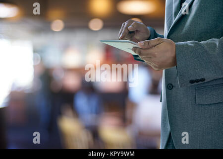 man touch tablet, laptop connecting wifi technology business people workspace Stock Photo