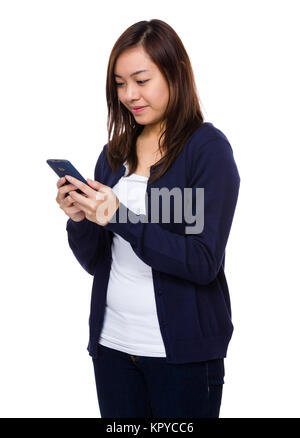 Asian young woman use of the mobile phone Stock Photo