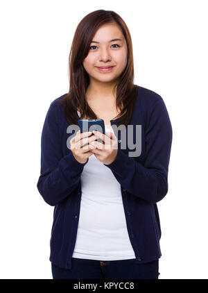 Asian Young Woman use of the mobile phone Stock Photo