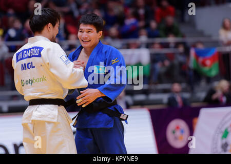 Kherlen Ganbold, Mongolia (white) and Yeldos Zhumakanov, Kazakhstan after final fight of Judo World Masters tour Stock Photo