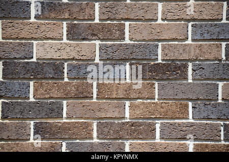 Closeup of a modern multicolored brick wall. Stock Photo