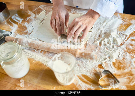 Baker Making Cookies in Cafe Stock Photo