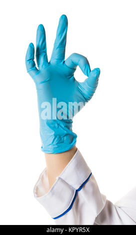 Hand in blue glove isolated on white showing ok sign. Stock Photo