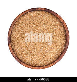 Dry ground fiber in bowl isolated on white background. Top view Stock Photo