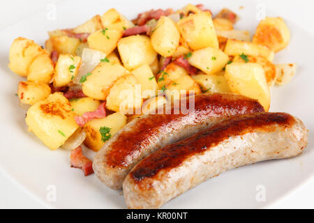 sausage and fried potatoes Stock Photo