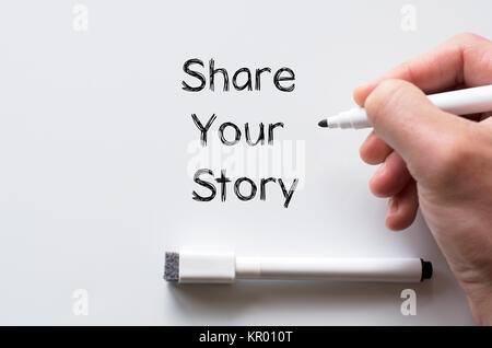 Share your story written on whiteboard Stock Photo