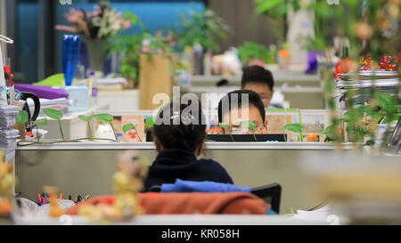 Asian Businessman Sitting At Desk Working Laptop Computer Business People Real Office. Team of asian business people working together in office. Stock Photo