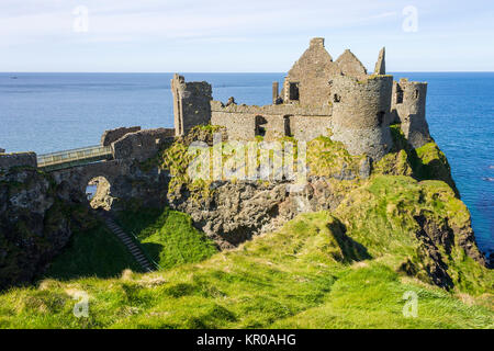 Dunluce Castle (Irish: Dun Libhse), a now-ruined medieval castle located on the edge of a basalt outcropping in County Antrim, Northern Ireland Stock Photo