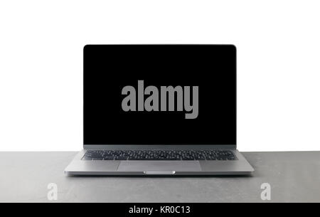 Front view of the laptop is on the work table isolated on white background, black screen for input text Stock Photo