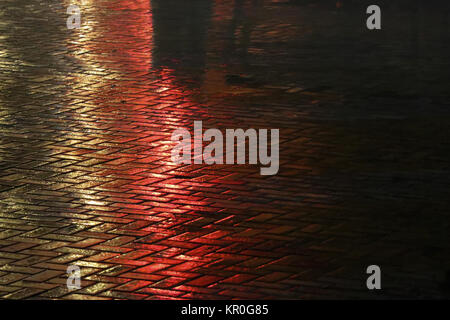 Beautiful light in the wet pavers scene Stock Photo