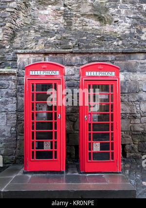 Two traditional red telephone boxes Stock Photo
