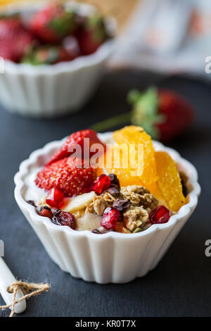 Granola with Orange,Strawberry on yogurt Stock Photo