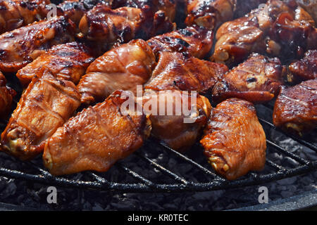 Chicken buffalo wings cooked on smoke grill Stock Photo