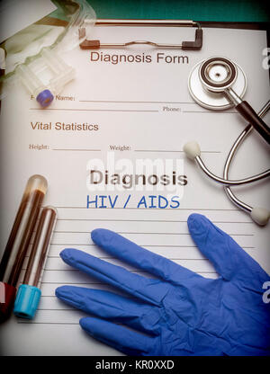 Diagnostic form, HIV / AIDS, Vial of blood samples and Medicine in a hospital, conceptual image Stock Photo