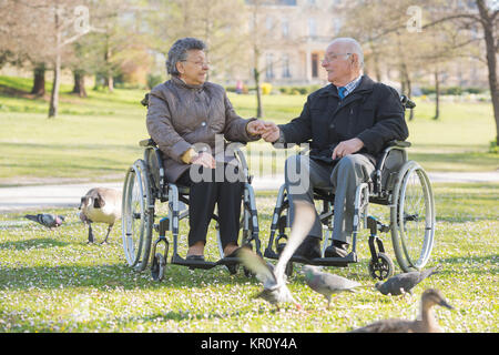 elderly couple in the park Stock Photo