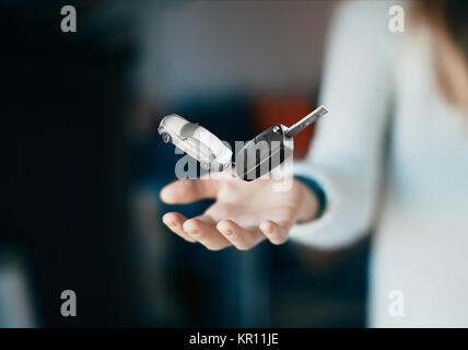 Keys on hand, new car, business Stock Photo