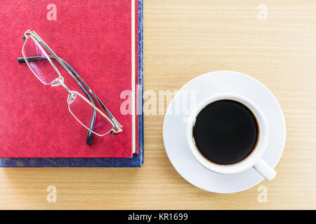 Coffee on a wood table and glasses Stock Photo