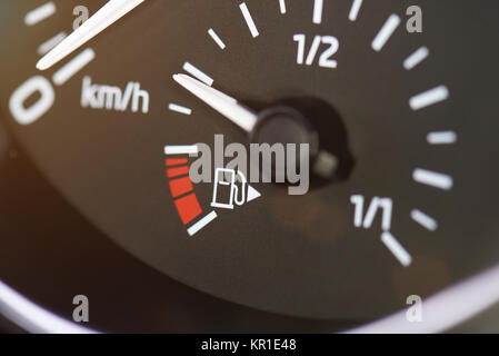 Car fuel gas tank meter close up on modern car dashboard Stock Photo