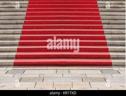 Red carpet on stairway Stock Photo