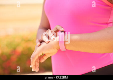 Woman Sports Training Using Fitness Fitwatch Steps Counter Stock Photo