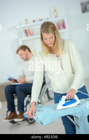 Woman doing some ironing Stock Photo