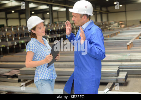 workers having a conversation Stock Photo