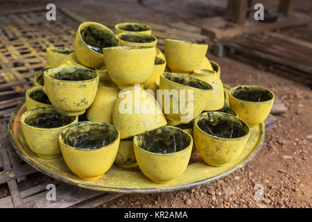 Lacquerware factory in Bagan, Myanmar. Lacquerware includes boxes, tableware, cups, plates etc Stock Photo