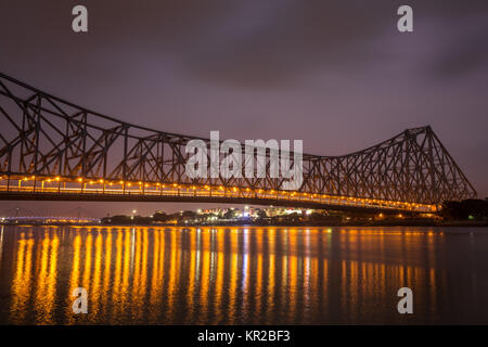 Howrah bridge - The historic cantilever bridge on the river Hooghly during the night in Kolkata, India Stock Photo