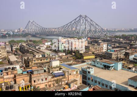 Howrah bridge - The historic cantilever bridge on the river Hooghly during the day in Kolkata, India. Top view photo Stock Photo