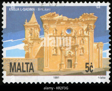 MALTA - CIRCA 1991: A stamp printed in Malta, shows Old Church Birkirkara, circa 1991 Stock Photo