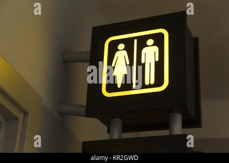 Toilet sign with arrow Stock Photo