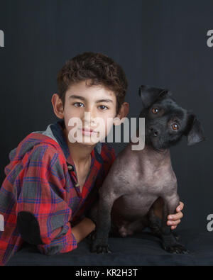 Portrait of Boy and Peruvian Dog Stock Photo