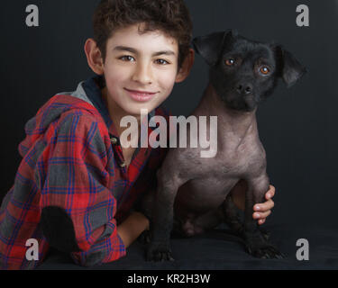 Portrait of Boy and Peruvian Dog Stock Photo