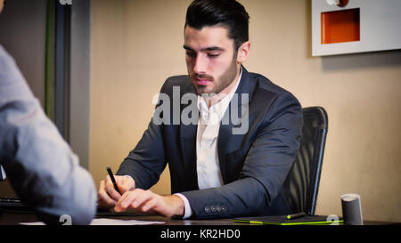 Businessmen working together on projects Stock Photo