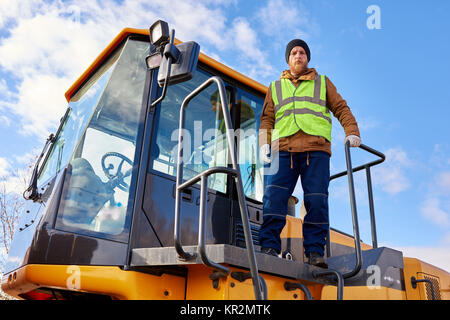 Bearded Gold Miner Posing on Truck Stock Photo