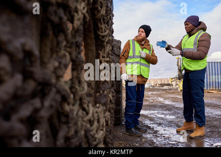 Workers Inspecting Site Stock Photo