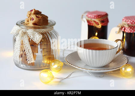 Tea with pastries for breakfast. Sweets and pastries with nuts f Stock Photo