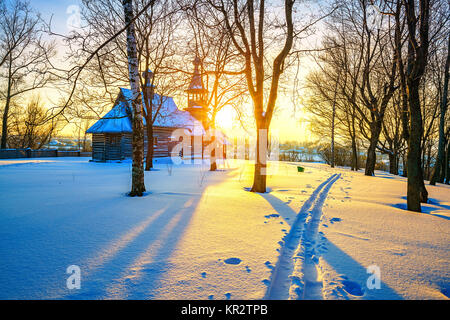 Russian church in winter forest Stock Photo