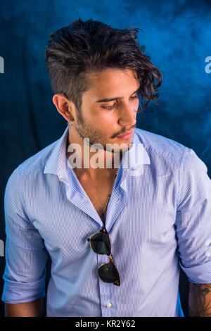 Stylish handsome young man in studio shot Stock Photo