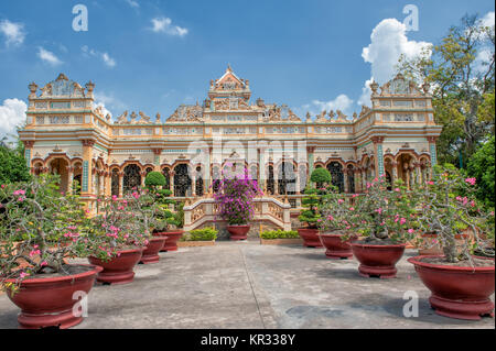 The Vinh Trang Pagoda in My Tho, Vietnam. This pagoda is one of the most beautiful and famous in the Mekong delta. Stock Photo