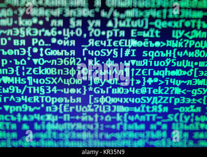 Vintage hacker code on display console bokeh backdrop Stock Photo