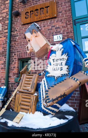 A 'junk art'  sculpture of a hockey goalie by Patrick Amiot on display in the Distillery district of Toronto Canada Stock Photo