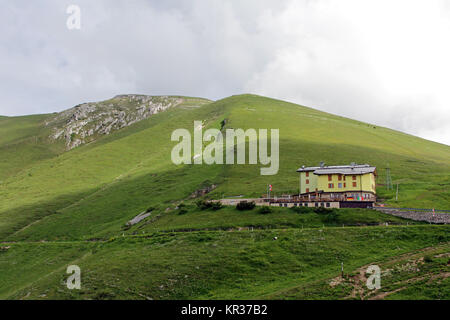 the yellow mountain lodge on mount baldo in italy. a mountain cabin in the mountains Stock Photo