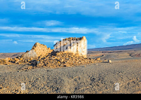 coastline in lanzarote in playa blanca with destroyed old fishermens hut Stock Photo