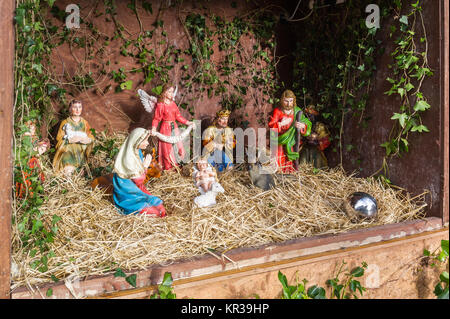 Christmas Nativity scene on a bed of straw. Stock Photo