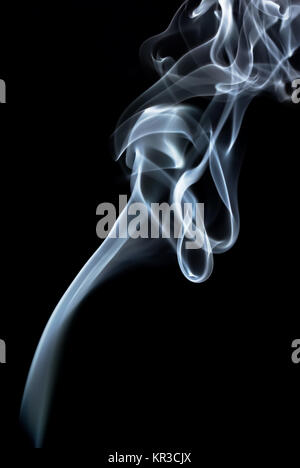 Curls of smoke Stock Photo