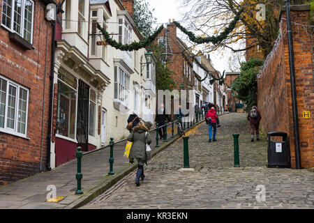 Looking up the street called 'Steep Hill', Lincoln, England, UK Stock Photo