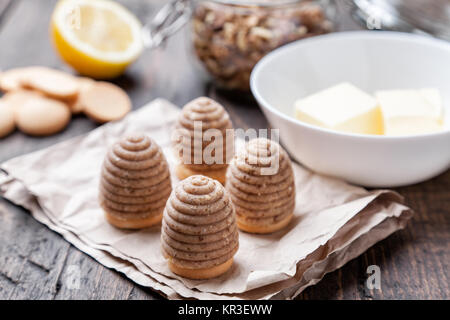 Traditional bee nest cake on wooden background Stock Photo
