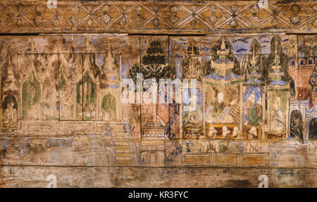 Ancient Thai mural painting on wooden temple wall Stock Photo